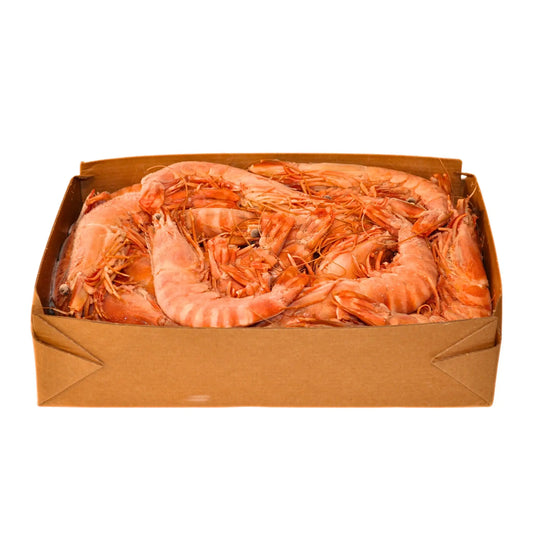 Kokta gambas räkor (storlek 10/15) i låda, högsta kvalitet skaldjur, perfekt för eleganta måltider och festliga tillfällen.